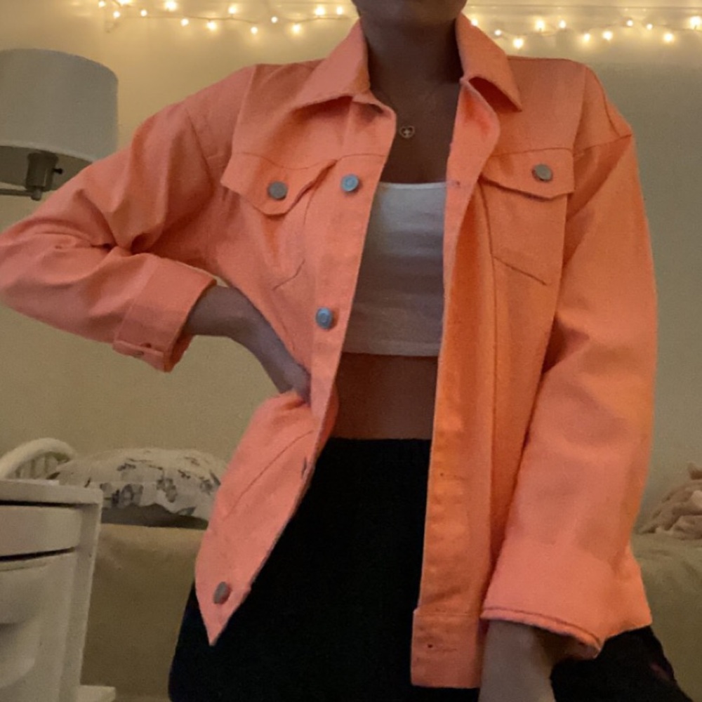 Bright orange denim jacket